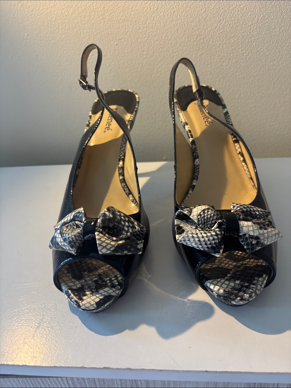 Women's Black Patent Slingback Peep-Toe Heels with Snake-Print Bow